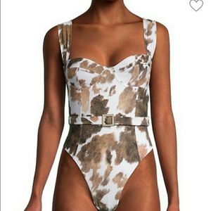 Weworewhat cowprint suit.